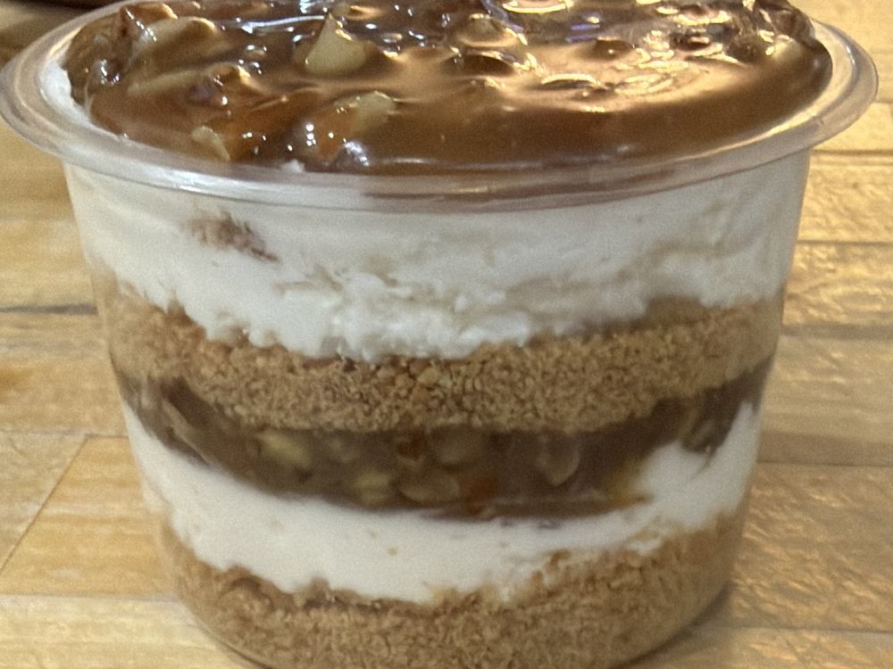 A caramel trifle layered with cream and crumb
